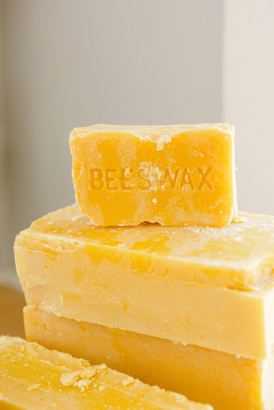 100% Pure Beeswax Blocks Stacked - Why Beeswax Is Better Than Paraffin or Soy Wax Blog Article Cover